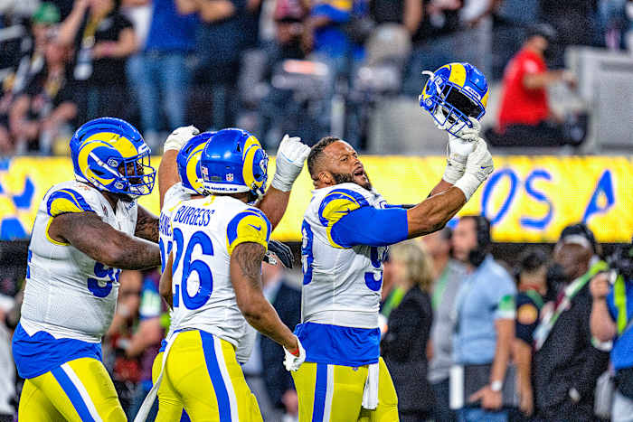 Rams defensive tackle Aaron Donald point to his ring finger after winning the Super Bowl.